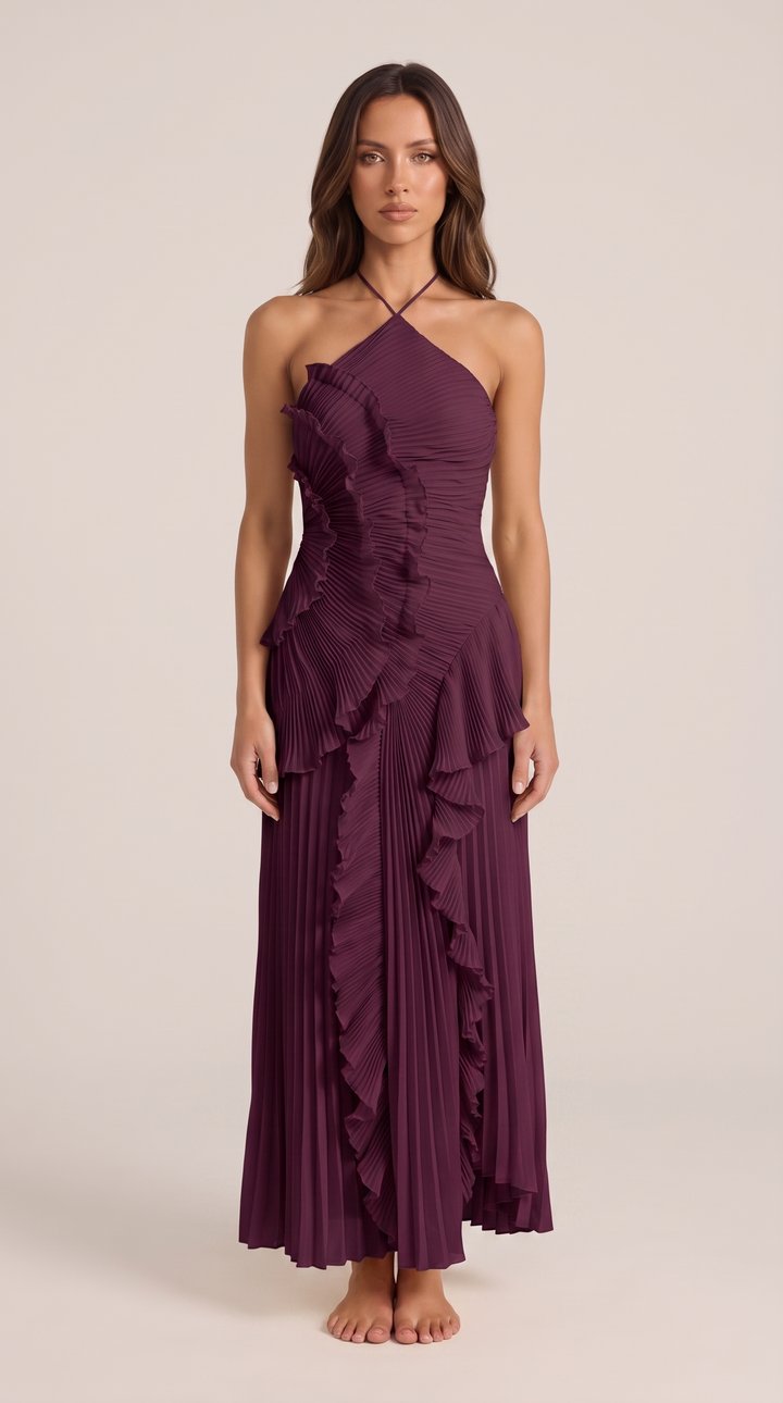 Halterneck detail of an elegant women's sleeveless maxi dress, showcasing flowy fabric & asymmetric hem.