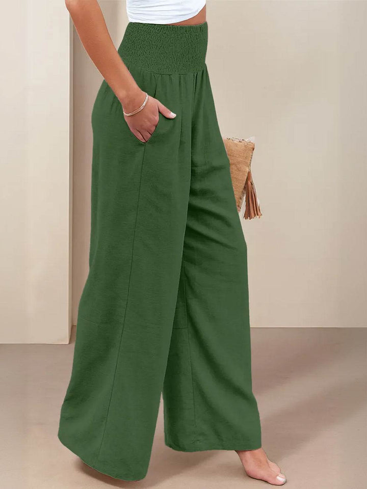 Versatile women's smocked high waist wide leg palazzo trousers, comfortable fit.