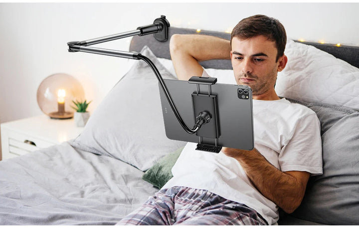Universal phone & tablet holder, adjustable stand for hands-free desk viewing of mobile devices.