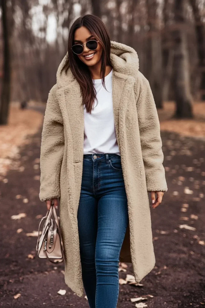 Women's cozy oversized hooded winter coat for ultimate warmth and style.