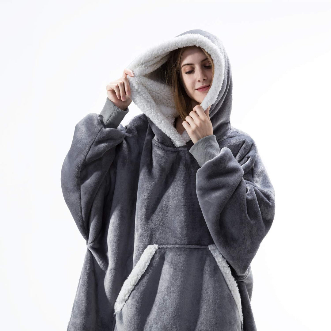 Soft wearable blanket hoodie, perfect for snuggling on the couch.