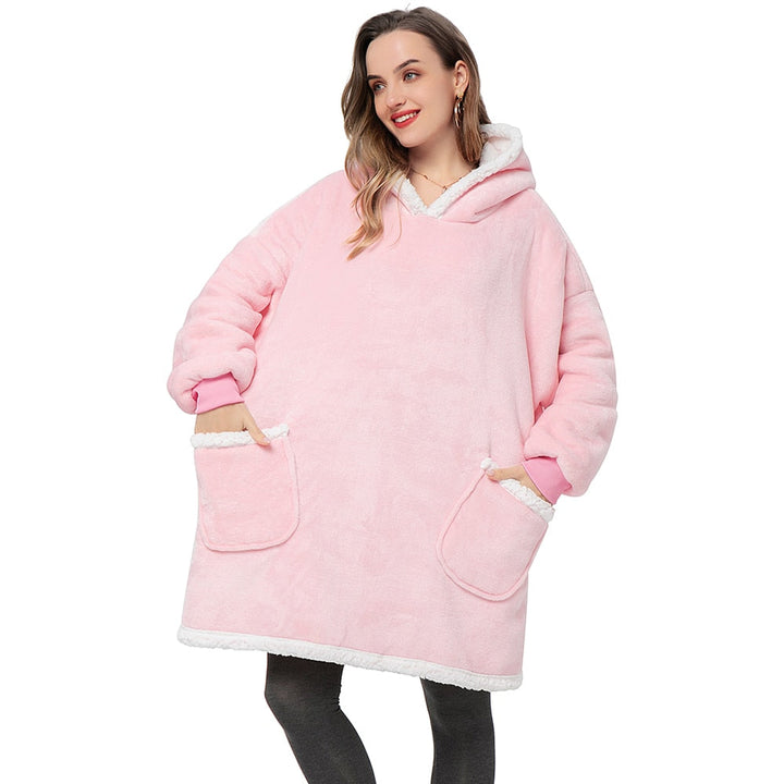 Oversized wearable hoodie blanket, ideal for relaxing at home in style.