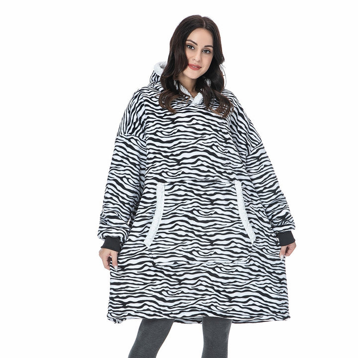 Snuggle up in this oversized wearable hoodie blanket, perfect loungewear.