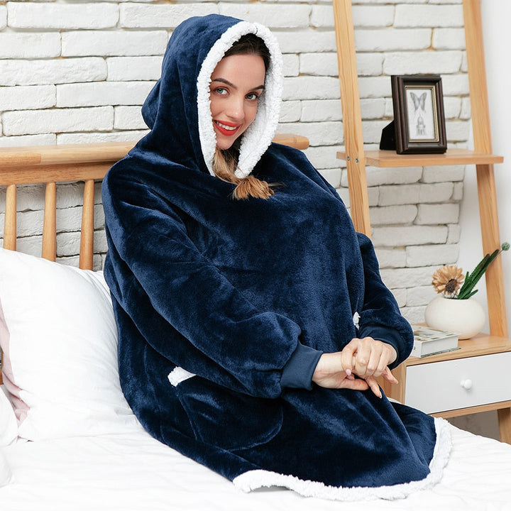 Comfortable unisex wearable blanket hoodie, perfect for indoor activities.