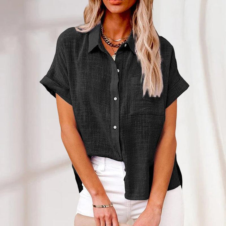 Comfortable loose fit women's short sleeve blouse, a stylish casual button up top.