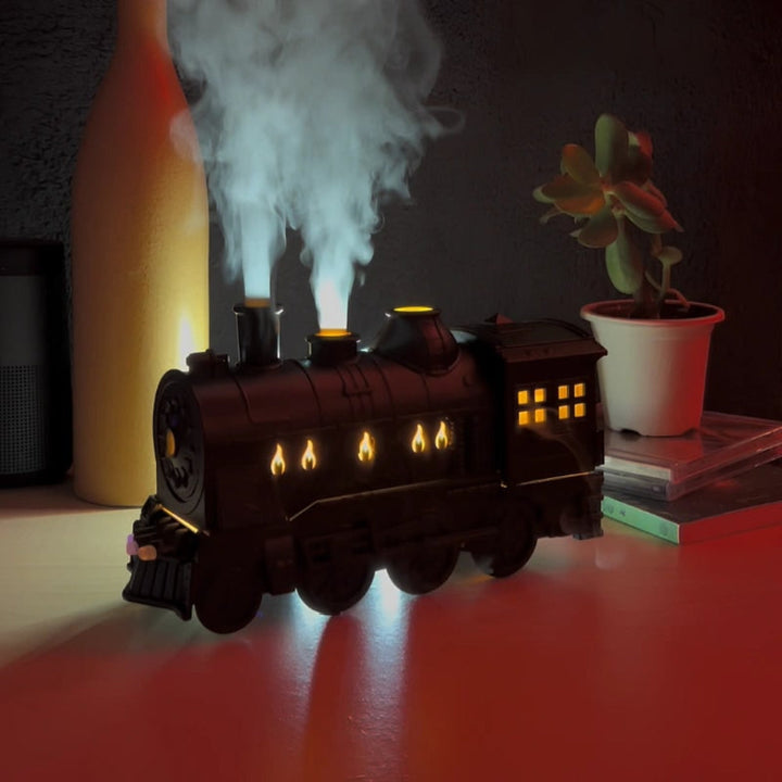 Desktop decorative train humidifier & aromatherapy essential oil diffuser with soothing LED night light.