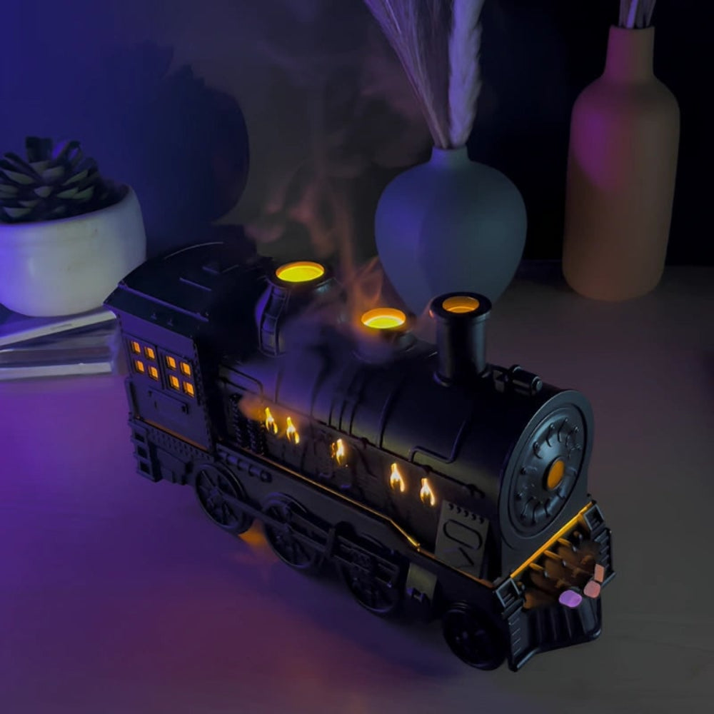 Elegant train-shaped essential oil diffuser & air humidifier with ambient LED light for relaxation & decor.
