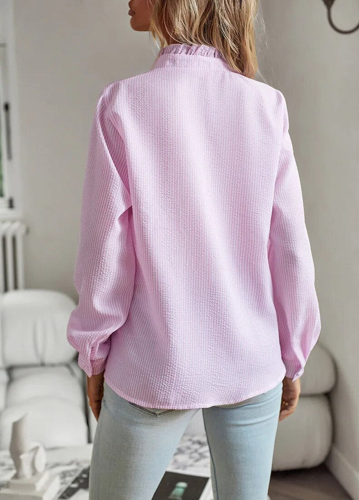 Versatile women's blouse, a chic and comfortable statement piece for modern apparel. Womens tops.