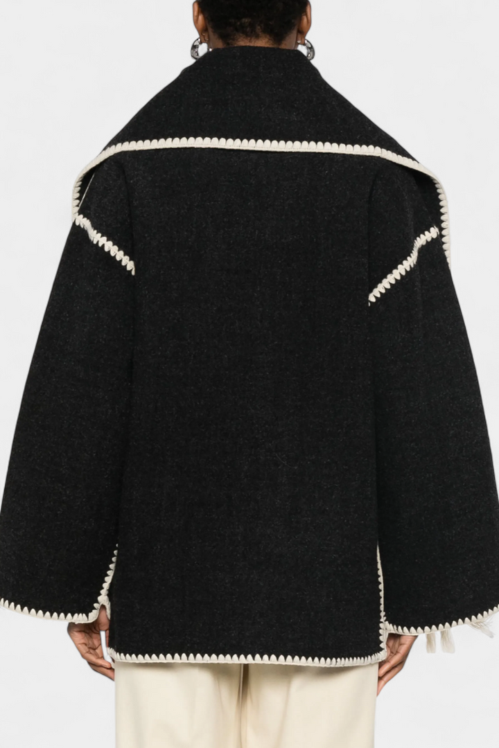Sophisticated women's elegant fringe-trim scarf coat, a stylish choice for fall/winter outerwear.
