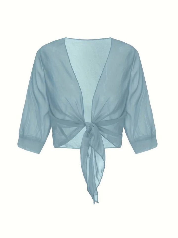 Flowy women's sheer tie front crop cardigan, perfect for adding an elegant touch to any ensemble.