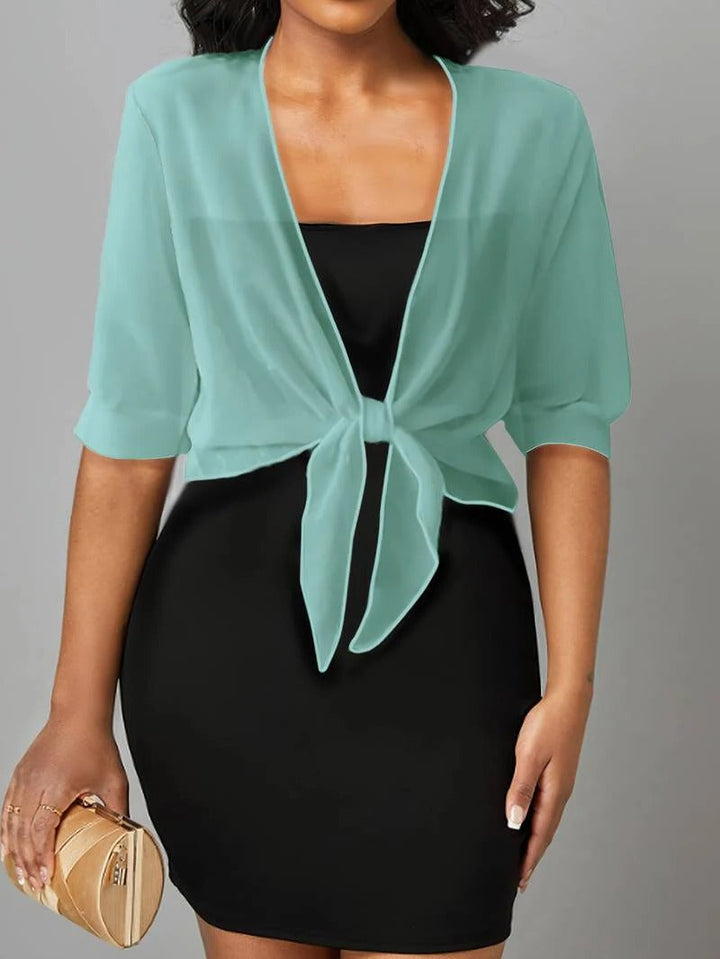 Fashionable women's sheer tie front crop cardigan, adds an elegant touch to any outfit.