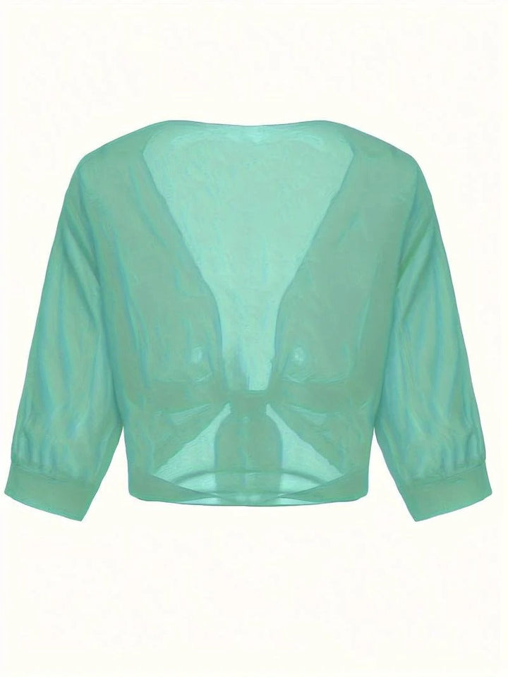 Breathable women's sheer crop cardigan with 3/4 sleeves and a chic tie front detail.