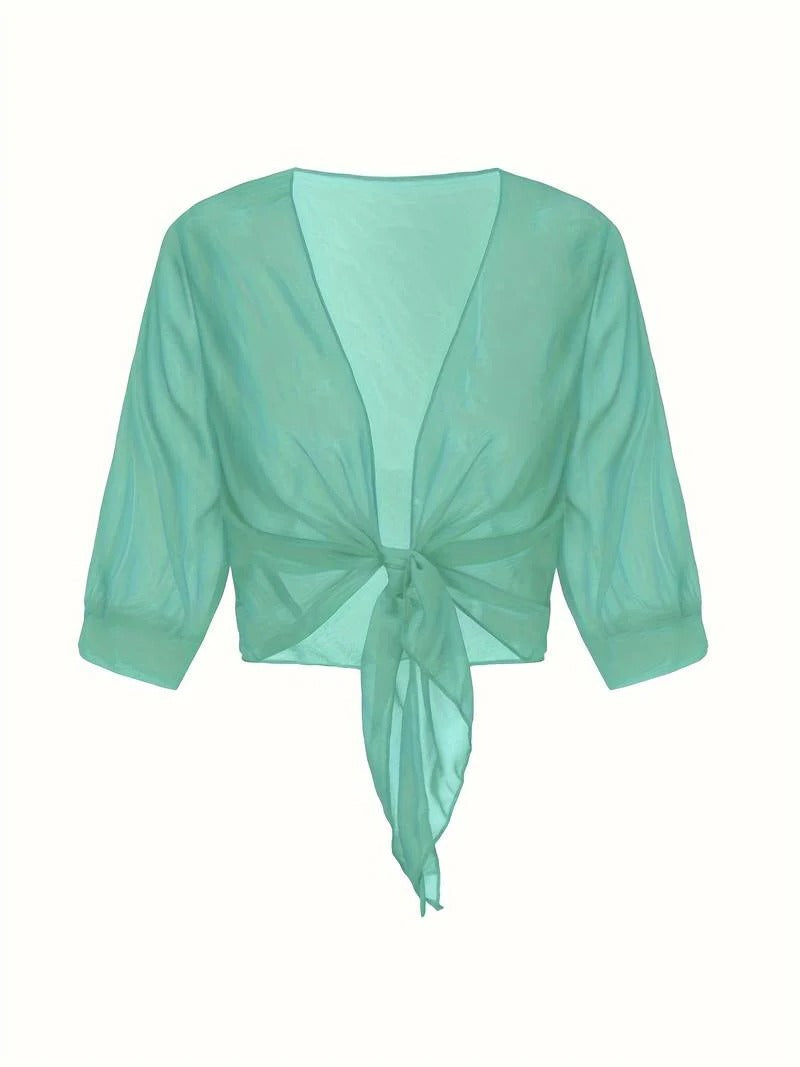Modern women's sheer tie front crop cardigan, ideal for creating a layered summer outfit.