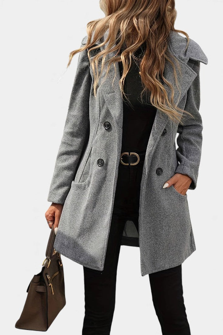 Elegant women's gray hooded double-breasted mid-length coat. Perfect versatile outerwear for fall & winter fashion.