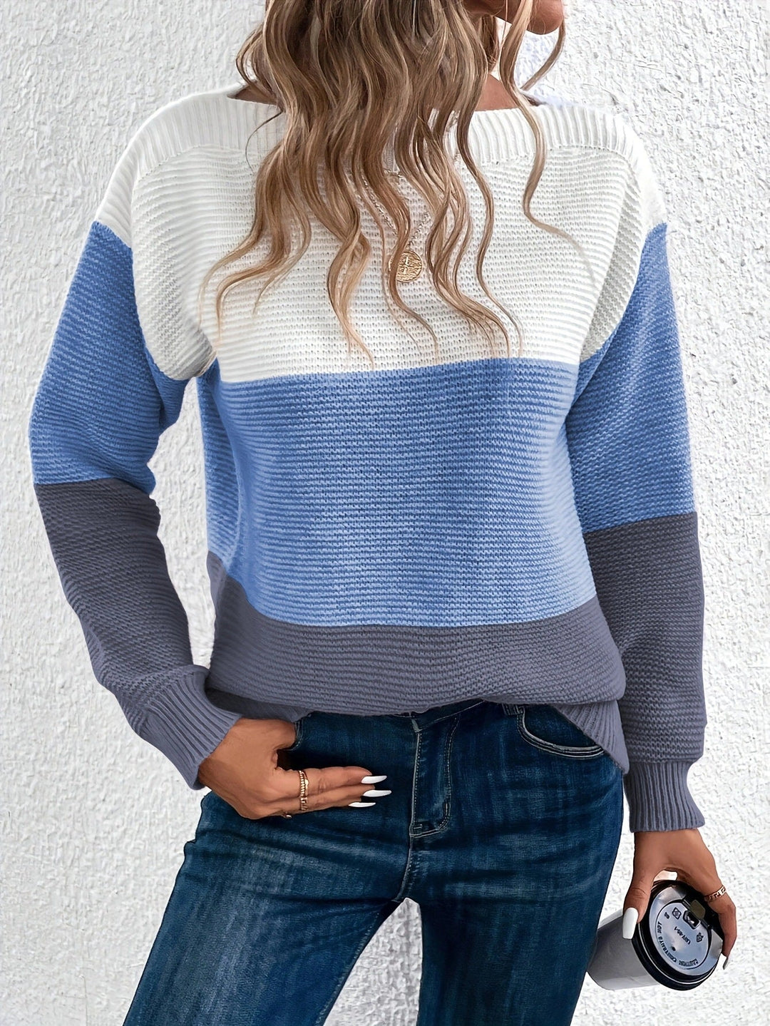 Cozy women's long sleeve comfort sweater, essential knit pullover for casual and everyday style.