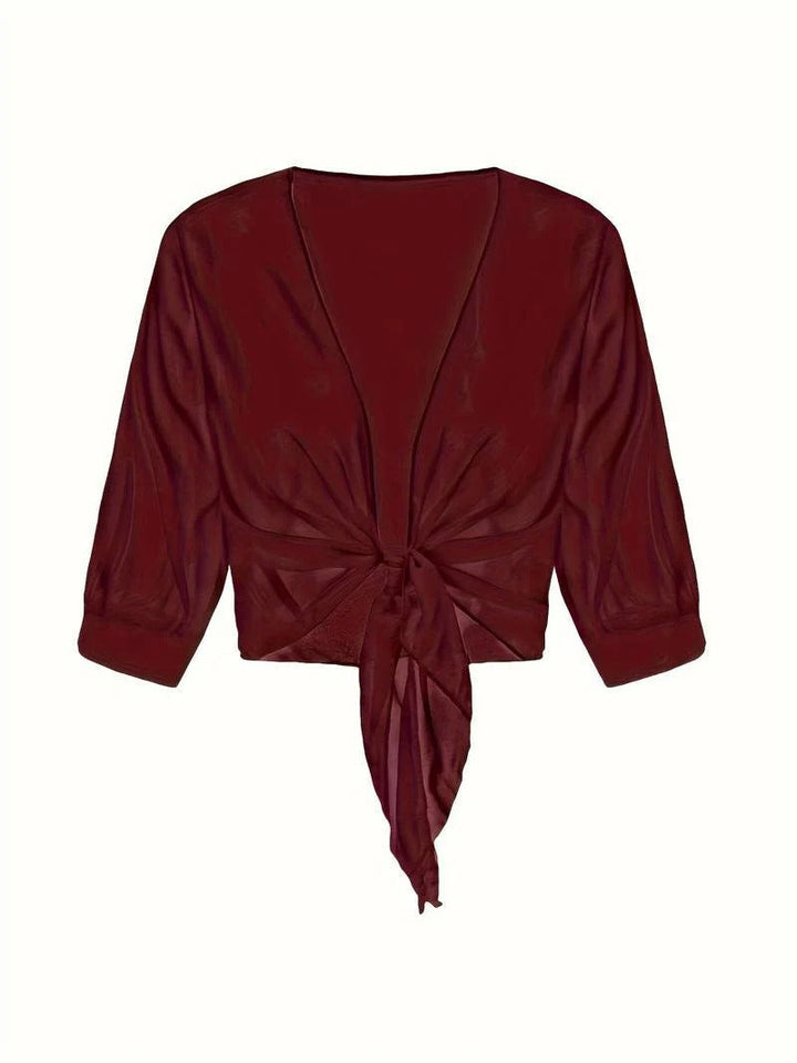 Women's 3/4 sleeve sheer crop cardigan with tie front, a perfect blend of comfort and style.