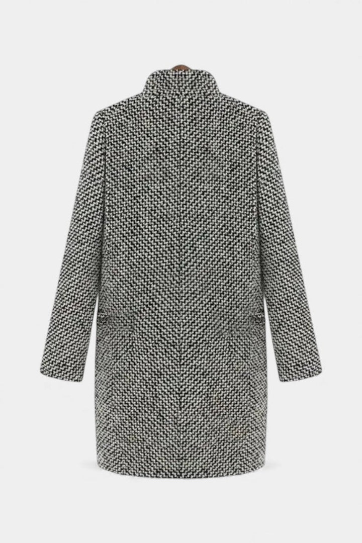 Stylish women's long gray overcoat, a chic trench jacket for sophisticated fall & winter looks.