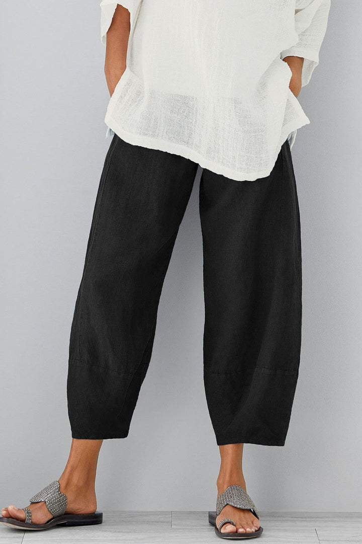Chic women's wide leg cropped pants with elastic waist, ideal for spring & summer fashion or comfortable travel.