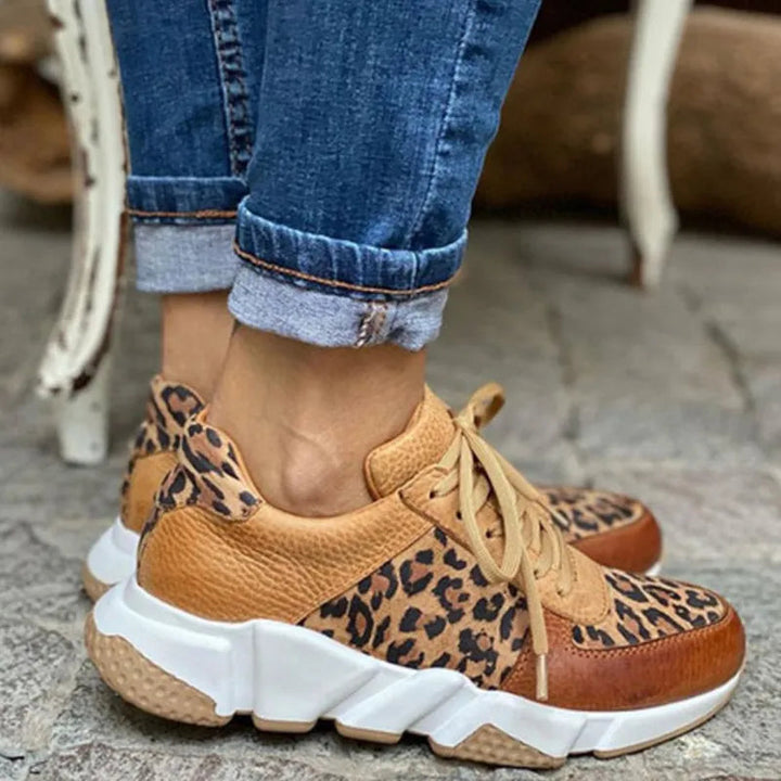 Stylish women's leopard print sneakers. Trendy animal print casual footwear, perfect for comfort & walking.