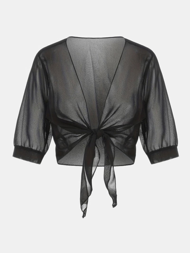 Sophisticated women's sheer crop cardigan with tie front, a stylish and practical layering piece.