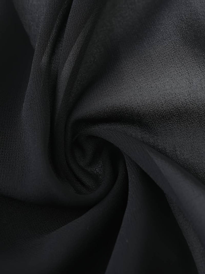 Women's sheer tie front crop cardigan in a delicate fabric, perfect for elegant summer evenings.