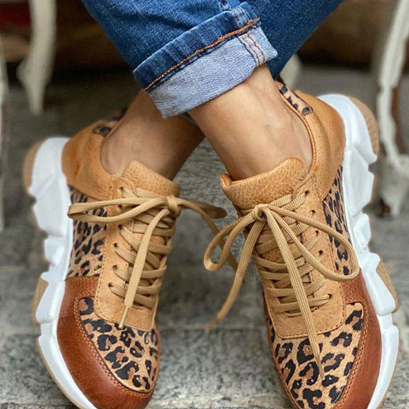 Women's chic leopard print lace-up sneakers, comfortable casual fashion footwear for trendy walking.