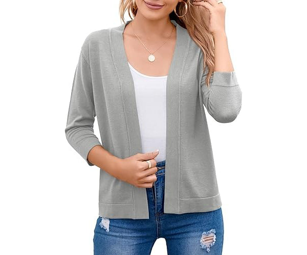 Layered women's cozy open-front cardigan sweater, an essential for comfortable, stylish outfits.