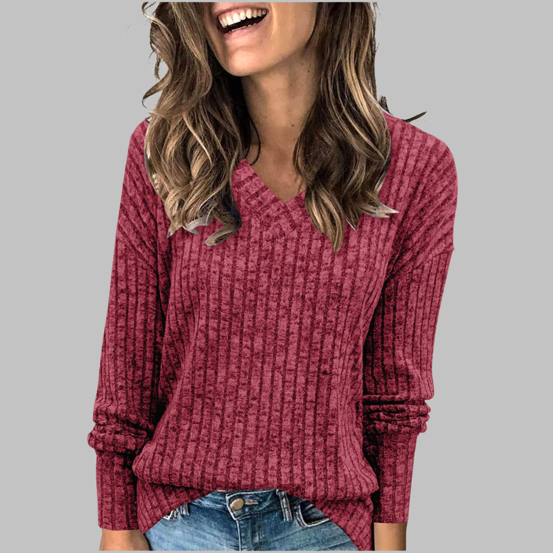 Stylish women's V-neck relaxed fit sweater, long sleeves, perfect for casual fall outfits.