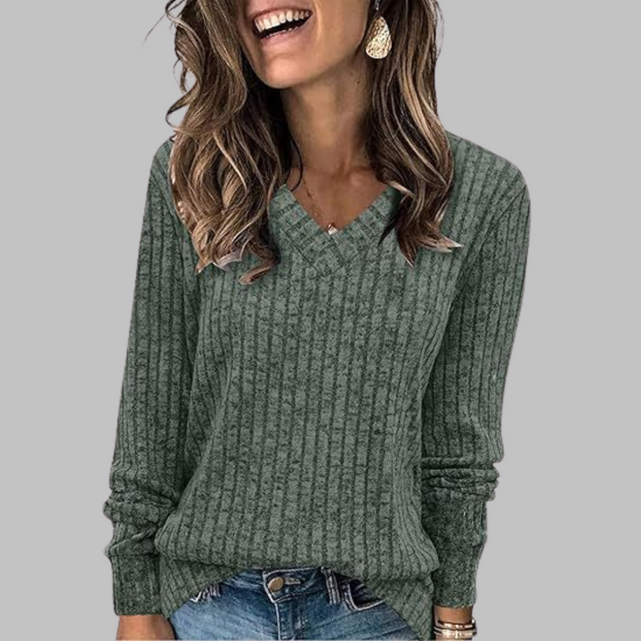 Comfortable women's V-neck long sleeve sweater, relaxed fit, great for layering in fall & winter.
