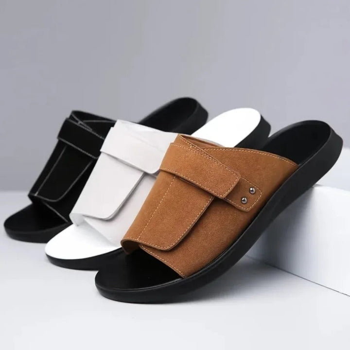 Men's fashion slides with ergonomic molded sole and adjustable strap, ensuring ultimate comfort for summer.