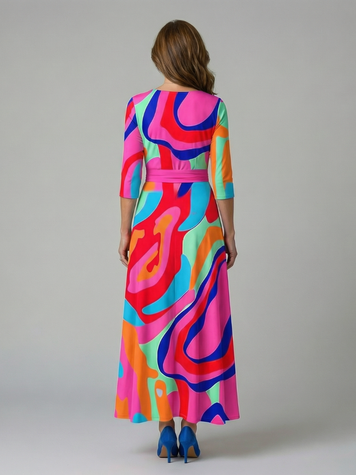 Women's flattering floral wrap midi dress with V-neck. Elegant A-line style for spring/summer events.