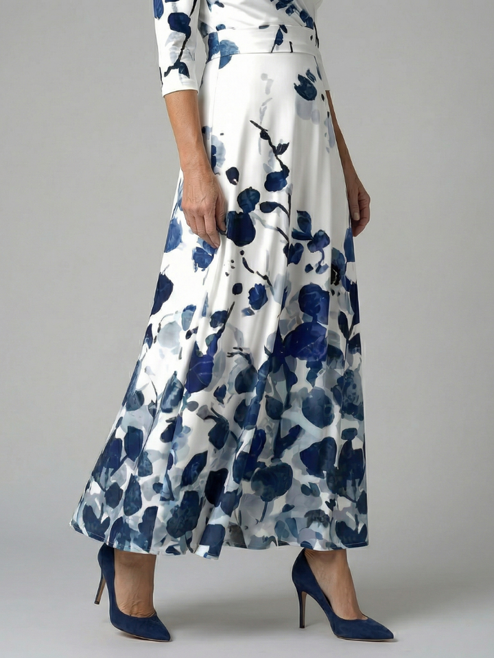 Comfortable women's floral wrap midi dress. Elegant V-neck design for spring/summer versatility.