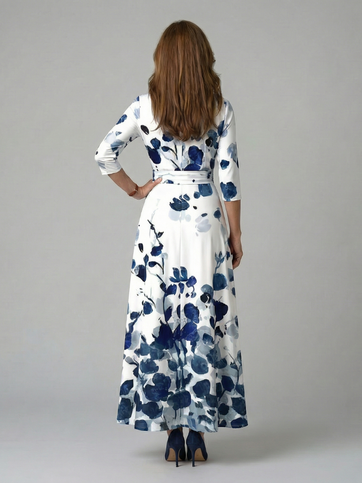 Fashionable women's floral wrap midi dress. Elegant A-line cut, perfect for stylish events and parties.