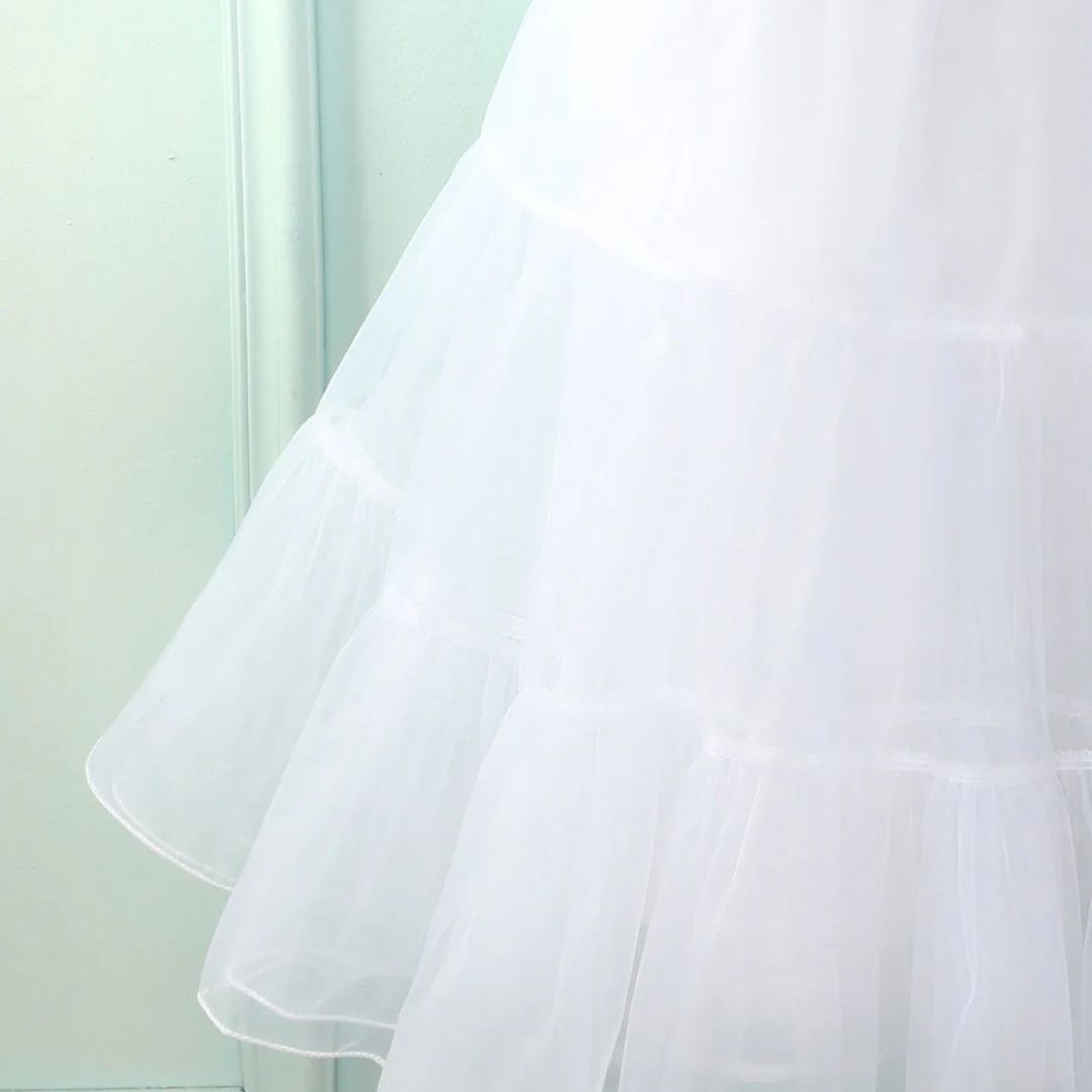 Vibrant red layered tutu petticoat, an elegant underskirt for women's glamorous fashion and party costumes.