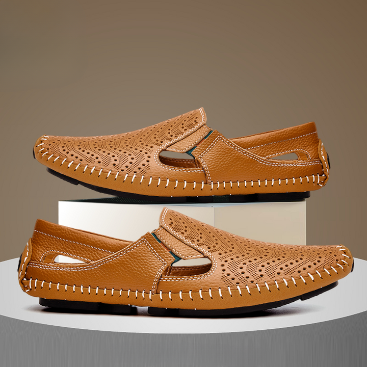 Versatile men's perforated slides with woven stitch. Perfect for beach, pool, or casual outings.