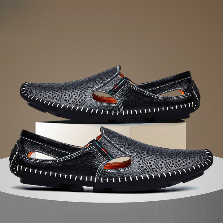 Step into summer with men's classic perforated slides & woven stitch. Breathable & comfortable.