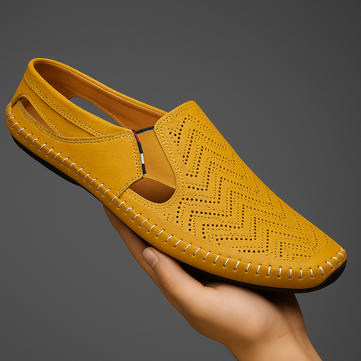 Easy slip-on men's perforated slides with stylish woven stitch. Perfect for relaxed summer days.