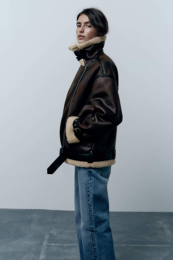 Stylish brown lapel jacket for women, insulated & water-repellent. Ideal layering piece for outdoor comfort.