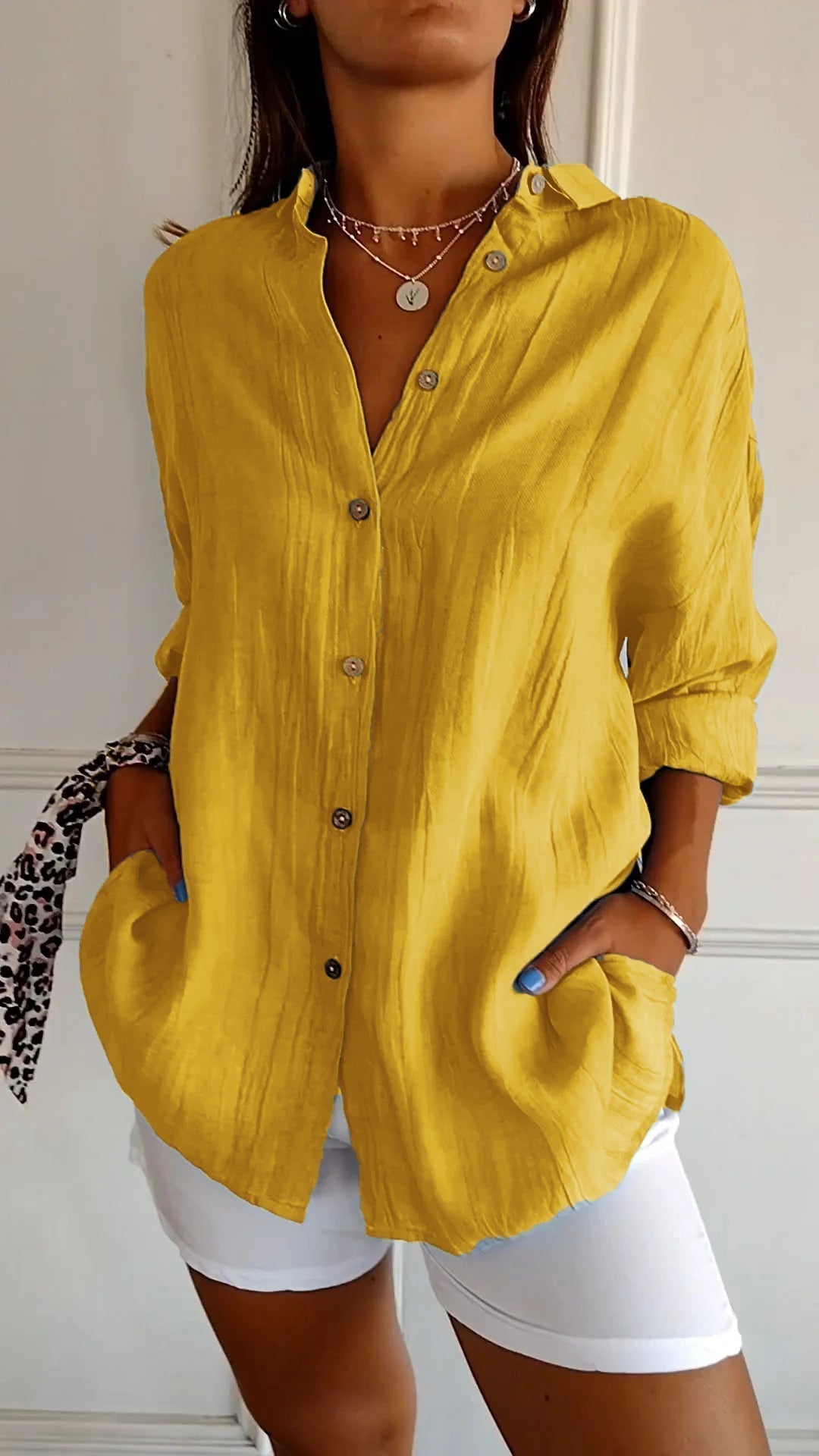 Stylish ladies' pleated top, a comfortable and modern summer fashion essential.