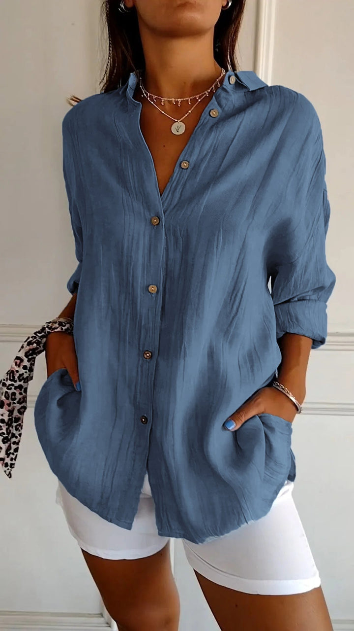 Women's elegant pleated blouse for versatile casual chic and comfort.