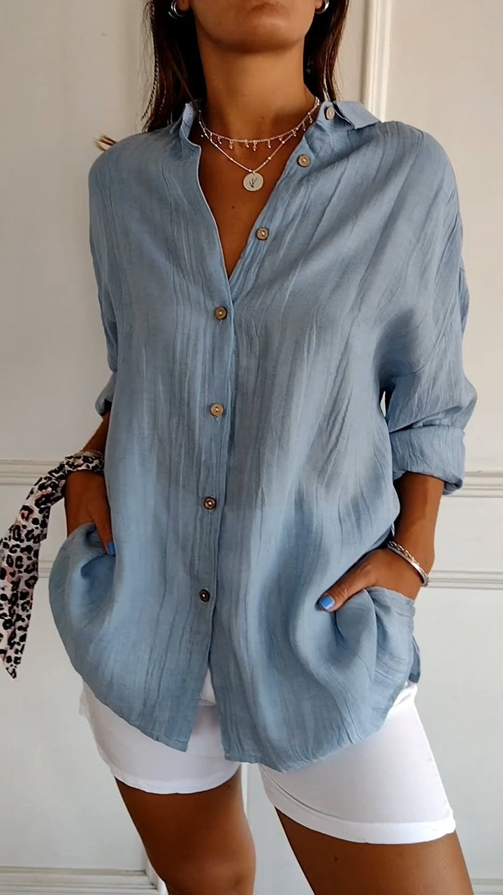 Versatile elegant pleated top for women, perfect for spring and summer fashion.