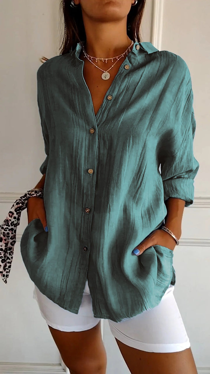 Effortless style with this elegant pleated women's fashion top.