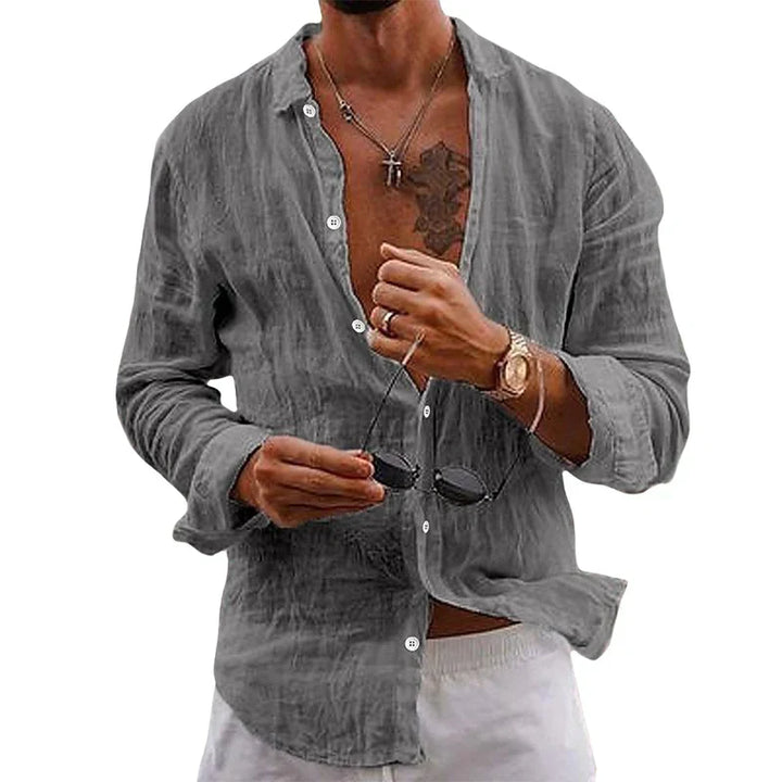 Light blue men's long sleeve linen shirt, elegant button-up for stylish resort & summer casual outfits.