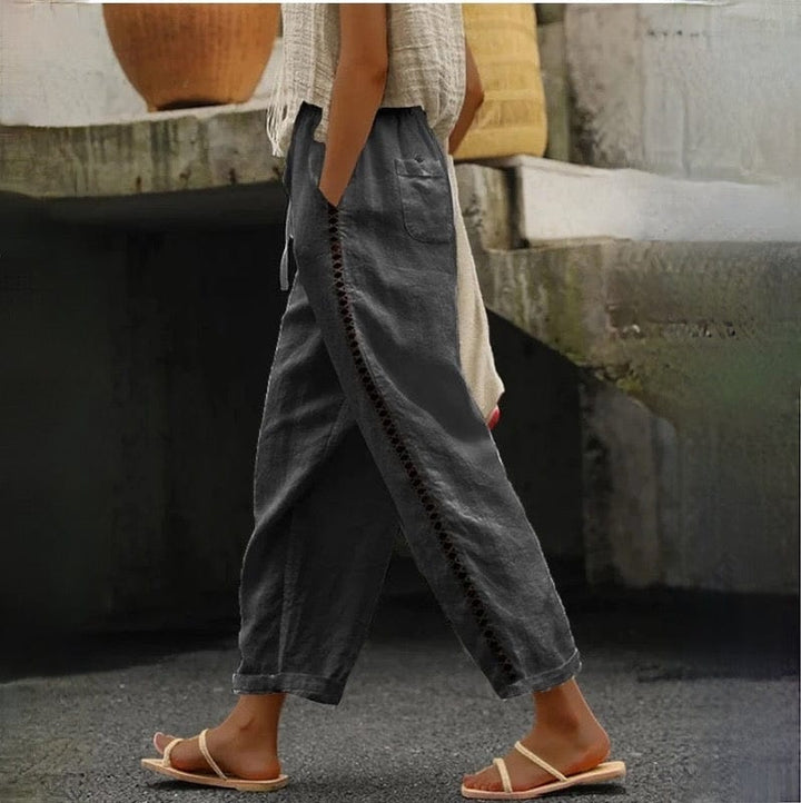 Versatile women's summer cropped pants with elastic drawstring waist and chic eyelet trim in breathable linen.