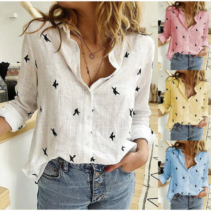 Lightweight women's blouse featuring vibrant bird print. Long sleeve, easy care design.