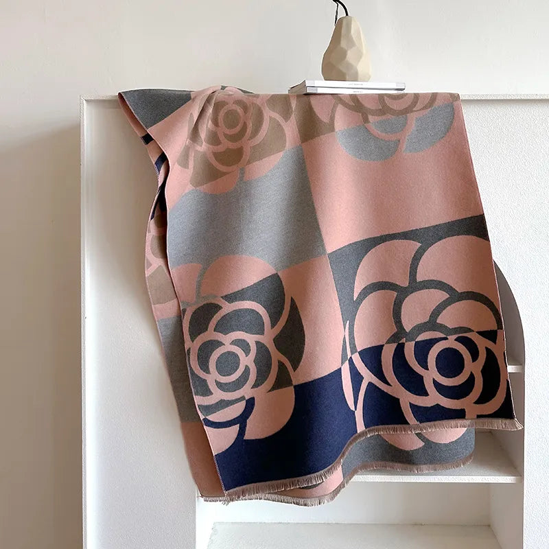 Elegant women's reversible floral cashmere blend scarf, adding a touch of style & warmth to any winter outfit.