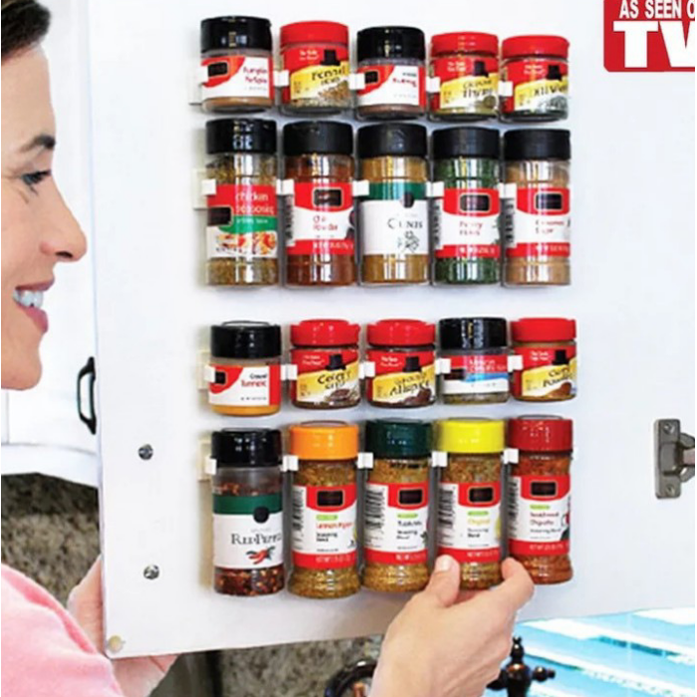 Strong grip adhesive spice rack strips, ensuring bottles stay secure in busy kitchen cabinets.