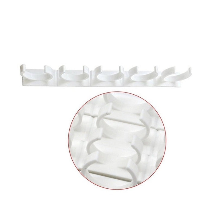 Easy-install adhesive spice gripper strips, perfect for kitchen cabinet doors or pantry walls.