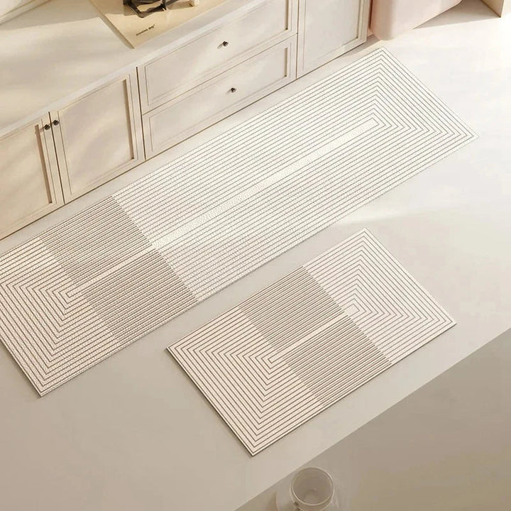 Stylish grey cushioned kitchen mat, absorbent & anti-slip, perfect for modern kitchen decor & comfort.