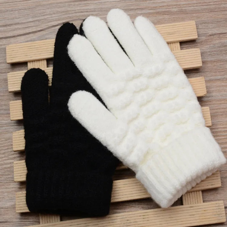 Elegant women's knitted gloves, perfect for winter fashion & tech interaction.